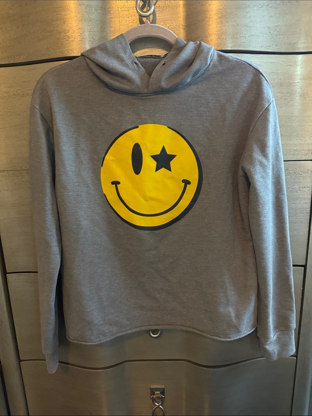 Gray Hoodie with Yellow Star-Eye Smiley Graphic